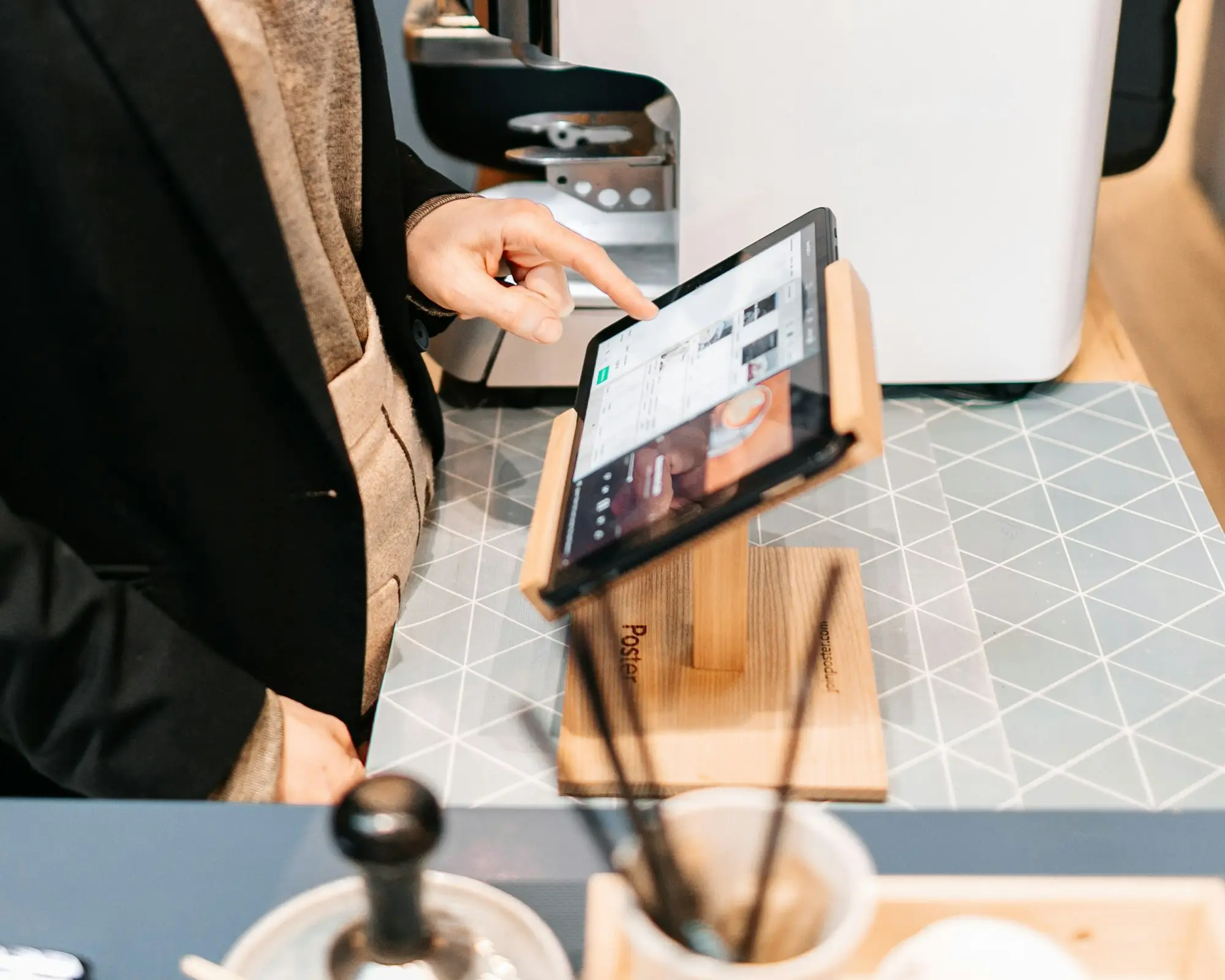 Business owner holding a tablet